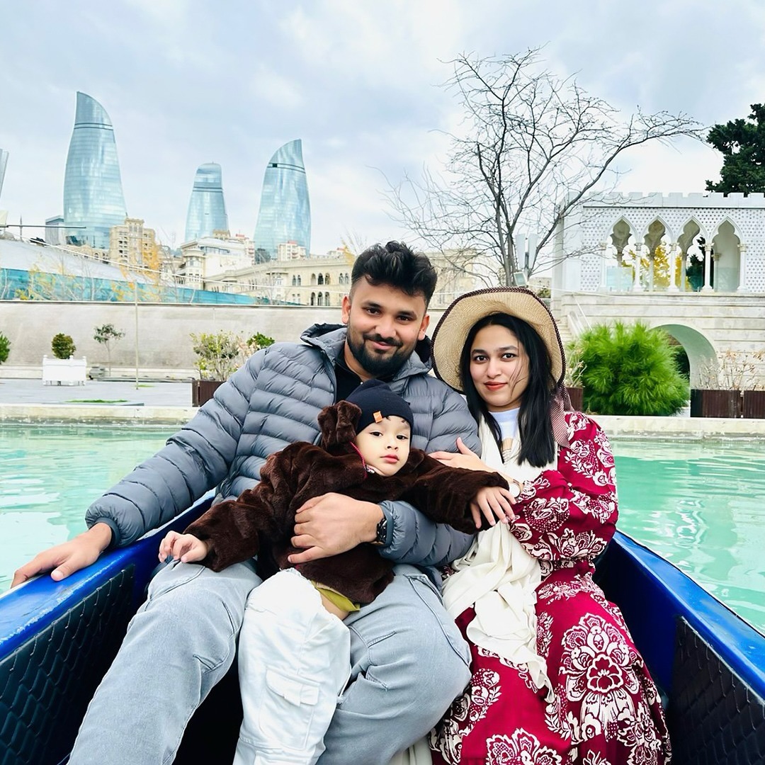 Family on a gondola in Baku, Azerbaijan